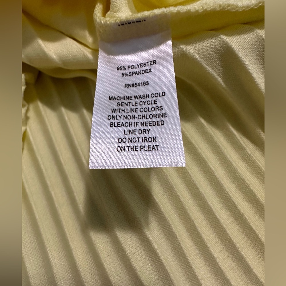 Marc New York. Andrew Marc High Neck Lemon Meringue Yellow Top. NWT!
Size: M - Picture 10 of 15